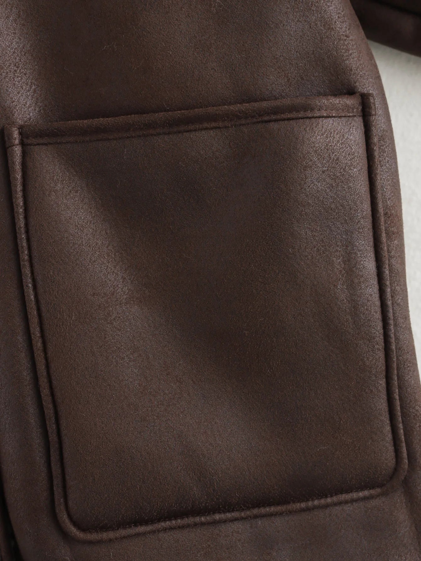 The Polished Raincoat